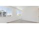Bright bedroom with large windows and neutral carpet flooring at 6910 Merseyside Ln, Castle Pines, CO 80108