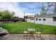 Spacious backyard with lawn, and outdoor seating area perfect for enjoying the beautiful outdoors at 14185 W 50Th Ave, Golden, CO 80403