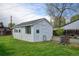 Exterior view of backyard shed with lots of light and a garden, offering additional storage or workshop space at 14185 W 50Th Ave, Golden, CO 80403