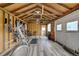 Spacious workout room features exposed beams, updated floor and various fitness equipment at 14185 W 50Th Ave, Golden, CO 80403