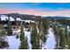 Aerial view of luxury homes in snowy mountain setting at 52 West Point Lode # A, Breckenridge, CO 80424