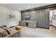 Spacious basement recreation room with wet bar and comfortable seating at 52 West Point Lode # A, Breckenridge, CO 80424