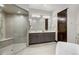Spa-like bathroom with double vanity, large shower, and soaking tub at 52 West Point Lode # A, Breckenridge, CO 80424