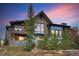 Home's exterior with hot tub and mountain views at 52 West Point Lode # A, Breckenridge, CO 80424