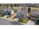 Aerial view of a two-story home with an attached garage and driveway at 294 Willowick Cir, Highlands Ranch, CO 80129