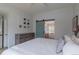 Bright main bedroom features ensuite bathroom with stylish barn door and ample natural light at 294 Willowick Cir, Highlands Ranch, CO 80129
