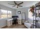 A functional home office with two windows and a comfortable workspace at 294 Willowick Cir, Highlands Ranch, CO 80129
