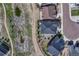 Overhead image reveals the home's layout, pool, landscaping, and proximity to nearby walking paths at 5251 Silver Hare Ct, Castle Rock, CO 80104