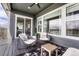 Balcony with comfortable seating and views of neighborhood and nearby mountains at 5251 Silver Hare Ct, Castle Rock, CO 80104