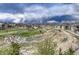 Aerial view of the neighborhood, landscape and nearby mountains at 5251 Silver Hare Ct, Castle Rock, CO 80104