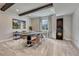 Basement game room with a poker table, dart board, and ample space for entertainment at 5251 Silver Hare Ct, Castle Rock, CO 80104
