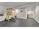 Spacious home gym featuring weight training and rubberized flooring at 5251 Silver Hare Ct, Castle Rock, CO 80104