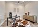 Bright office with modern desk, stylish decor, and ample natural light at 5251 Silver Hare Ct, Castle Rock, CO 80104
