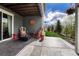 Cozy covered patio with unique decor and comfortable seating, offering a great outdoor space at 5251 Silver Hare Ct, Castle Rock, CO 80104