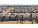 Aerial shot of the neighborhood showing well-maintained homes, green spaces, and surrounding community at 10055 Fort Worth Ct, Parker, CO 80134