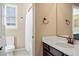 Bathroom featuring a shower with tub and vanity with white countertop at 10055 Fort Worth Ct, Parker, CO 80134