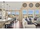 Bright, open living space with hardwood floors, lots of natural light and vaulted ceilings at 10055 Fort Worth Ct, Parker, CO 80134