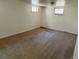 Basement featuring paneled walls and carpet flooring at 3054 Victor St, Aurora, CO 80011