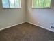 Bedroom with carpet flooring, two windows providing natural light at 3054 Victor St, Aurora, CO 80011