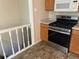 Kitchen with stainless steel gas oven and neutral countertops at 3054 Victor St, Aurora, CO 80011
