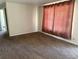 Cozy living room with neutral walls and carpet at 3054 Victor St, Aurora, CO 80011