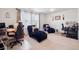 Home office area with carpeting, natural light, and furniture perfect for a work or study space at 5471 Ensenada Ct, Denver, CO 80249