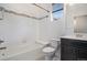 Bright bathroom with tub, mosaic tile detail, and modern vanity at 14700 E 104Th Ave # 1105, Commerce City, CO 80022