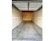 Empty single-car garage awaiting personalization and storage solutions at 14700 E 104Th Ave # 1105, Commerce City, CO 80022