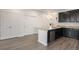 Open layout showcasing the kitchen with granite countertops seamlessly connected to the dining area at 14700 E 104Th Ave # 1105, Commerce City, CO 80022