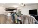 Inviting living area that flows into an open kitchen with stainless steel appliances, creating a modern living space at 14700 E 104Th Ave # 1105, Commerce City, CO 80022