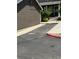 Designated parking area with number marking, adjacent to well-kept landscaping at 14700 E 104Th Ave # 1105, Commerce City, CO 80022