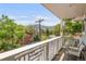 Relaxing balcony with mountain views and a comfortable seating area to enjoy the outdoors at 1824 Pearl St # B, Boulder, CO 80302