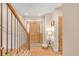 Inviting foyer with hardwood floors, staircase, and stylish decor creating a welcoming ambiance at 1824 Pearl St # B, Boulder, CO 80302