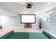 Finished basement featuring home theater and ample space at 12945 E Colorado Ave, Aurora, CO 80012