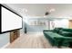 Finished basement featuring home theater and comfortable seating at 12945 E Colorado Ave, Aurora, CO 80012