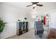 Bright bedroom with a ceiling fan and large closet at 12945 E Colorado Ave, Aurora, CO 80012