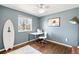 Comfortable bedroom with hardwood floors and a large window at 12945 E Colorado Ave, Aurora, CO 80012