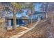 Steps leading to house and detached garage in backyard at 1361 W Custer Pl, Denver, CO 80223