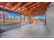 Covered patio with concrete floor and block walls at 1361 W Custer Pl, Denver, CO 80223