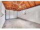 Spacious garage with overhead door and ample storage at 1361 W Custer Pl, Denver, CO 80223