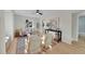 Bright and airy living room with hardwood floors and ample natural light at 1361 W Custer Pl, Denver, CO 80223