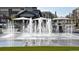 Beautiful fountain feature in the shopping center, creating a refreshing and inviting atmosphere for visitors at 6802 S Uriah St, Aurora, CO 80016