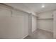 Spacious walk-in closet with ample storage and organizational features, including shelving and hanging rods at 6802 S Uriah St, Aurora, CO 80016