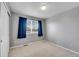 Comfortable bedroom with cozy carpet, window for natural light, and a closet with sliding doors at 3790 Aspen Hollow Ct, Castle Rock, CO 80104