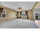 Expansive room featuring plush carpeting, natural light, and views of the surrounding landscape at 3790 Aspen Hollow Ct, Castle Rock, CO 80104