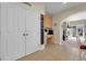 Hallway featuring large closet, a built-in desk and access to living spaces at 3342 Springmeadow Cir, Castle Rock, CO 80109