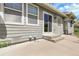 Exterior shot of home's patio with siding, small steps, and natural light at 3342 Springmeadow Cir, Castle Rock, CO 80109