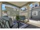 Inviting porch with comfortable seating area, perfect for relaxing and enjoying the outdoors with a nice striped rug at 3342 Springmeadow Cir, Castle Rock, CO 80109