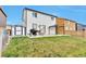 Spacious backyard featuring a shed, grill, patio, and fenced yard at 10042 Hudson St, Thornton, CO 80229