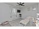This bedroom offers natural light, carpeted floors, and plenty of space at 10042 Hudson St, Thornton, CO 80229